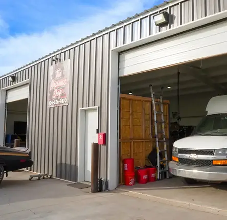 Exterior of The Mechanic Shop with open bay doors at 12001 FM 2590, Amarillo, TX